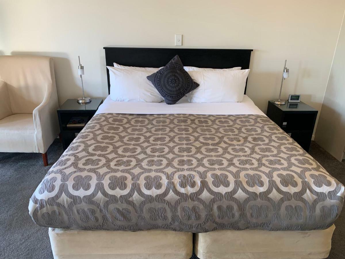 Salerno Motel Apartments Christchurch Luaran gambar A bed in a hotel room